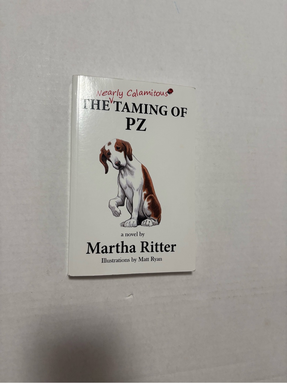 The Taming of PZ by Martha Ritter - White Cover with Brown Dog Illustration